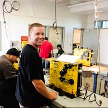 A student working on an industrial technology project in the classroom