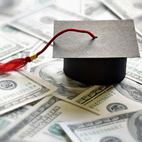 graduation cap with money