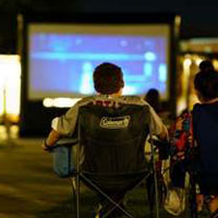 people watch movie in the lawn