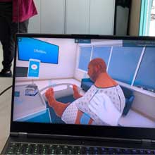 A laptop computer displaying a virtual patient used in the Virtual Training for nurses